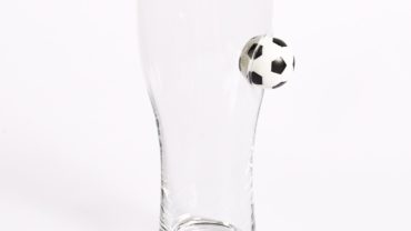 Want to make a memorable gift A glass with a bullet, a soccer ball or a puck made in a workshop